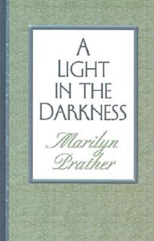 Hardcover A Light in the Darkness [Large Print] Book