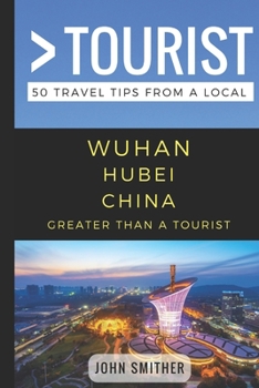 Paperback Greater Than a Tourist- Wuhan Hubei China: 50 Travel Tips from a Local Book