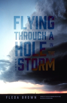 Paperback Flying Through a Hole in the Storm: Poems Book