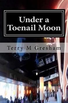 Paperback Under a Toenail Moon Book