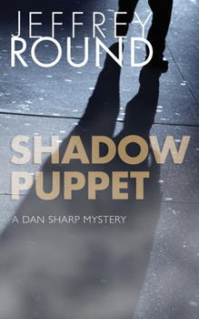 Paperback Shadow Puppet: A Dan Sharp Mystery Book