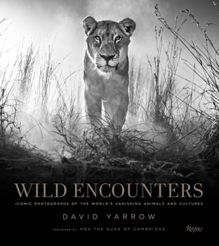 Hardcover Wild Encounters: Iconic Photographs of the World's Vanishing Animals and Cultures Book