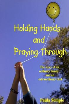 Paperback Holding Hands and Praying Through Book