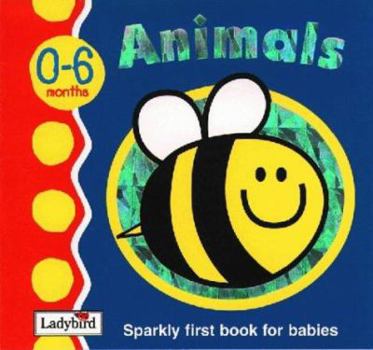 Paperback First Focus Board Book: Animals (First Focus) Book