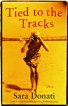 Paperback Tied to the Tracks Book