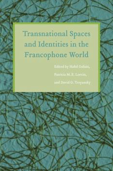 Paperback Transnational Spaces and Identities in the Francophone World Book