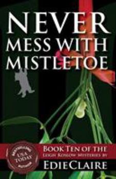 Paperback Never Mess with Mistletoe Book