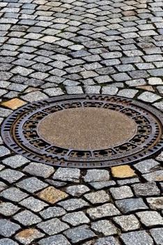 Manhole Cover on a Cobblestone Street Journal: Take Notes, Write Down Memories in this 150 Page Lined Journal