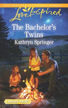 Mass Market Paperback The Bachelor's Twins [Large Print] Book