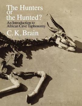 Paperback The Hunters or the Hunted?: An Introduction to African Cave Taphonomy Book