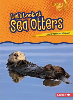 Paperback Let's Look at Sea Otters Book