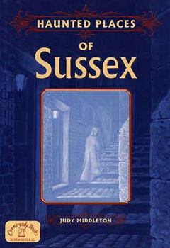 Paperback Haunted Places of Sussex Book