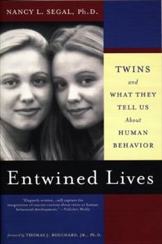 Paperback Entwined Lives: Twins and What They Tell Us about Human Behavior Book