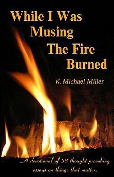 Paperback While I Was Musing The Fire Burned Book