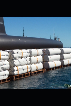 Paperback Submerged in Greed Book