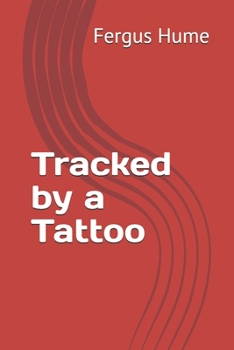 Paperback Tracked by a Tattoo Book