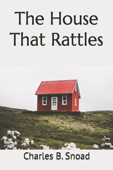 Paperback The House That Rattles Book