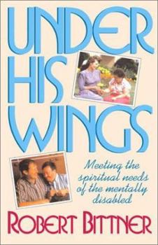 Paperback Under His Wings Book