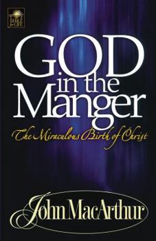 Paperback A God in the Manger Book