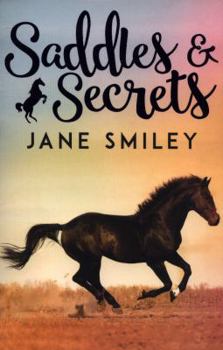 Paperback Saddles and Secrets (Riding Lessons) Book