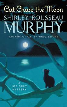 Mass Market Paperback Cat Chase the Moon: A Joe Grey Mystery Book