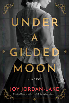 Paperback Under a Gilded Moon Book