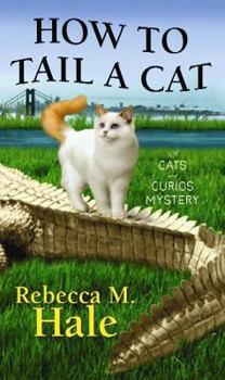 Hardcover How to Tail a Cat : A Cats and Curios Mystery [Large Print] Book