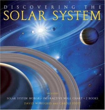 Paperback Discovering the Solar System [With 2 Books and Solar System Mobile; Interactive Wall Chart] Book