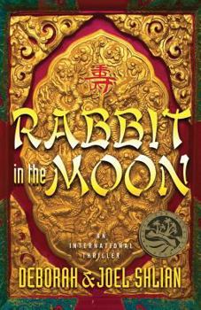 Paperback Rabbit in the Moon Book