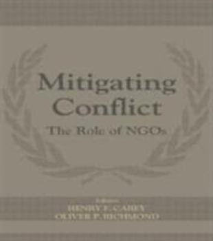 Paperback Mitigating Conflict: The Role of Ngos Book