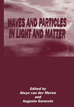 Paperback Waves and Particles in Light and Matter Book