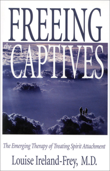 Paperback Freeing the Captives: The Emerging Therapy of Treating Spirit Attachment Book