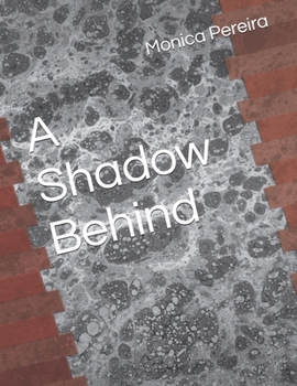 Paperback A Shadow Behind Book