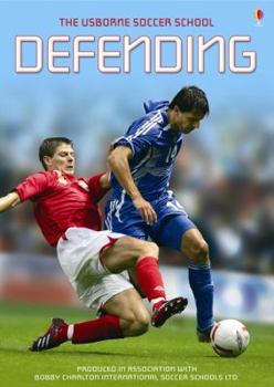 Paperback Defending (Usborne Soccer School) (Usborne Soccer School) Book