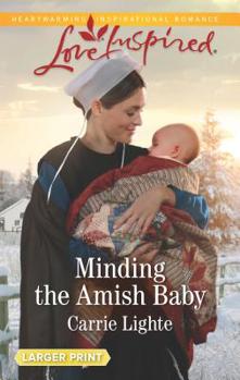 Mass Market Paperback Minding the Amish Baby [Large Print] Book