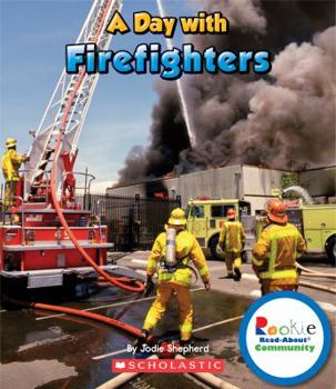 Paperback A Day with Firefighters Book