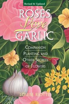 Paperback Roses Love Garlic: Companion Planting and Other Secrets of Flowers Book