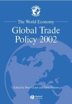 Paperback The World Economy: Global Trade Policy 2002 Book