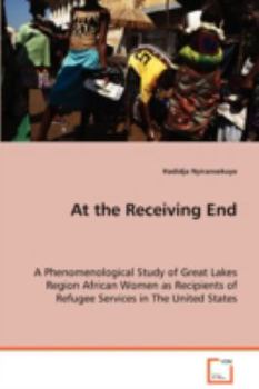 Paperback At the Receiving End Book