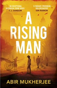 Paperback A Rising Man Book