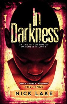 Paperback In Darkness Book