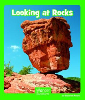 Paperback Looking at Rocks Book