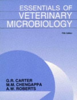 Paperback Essentials of Veterinary Microbiology Book