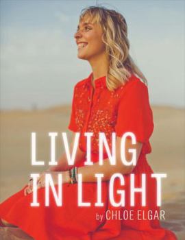 Paperback Living in Light Book