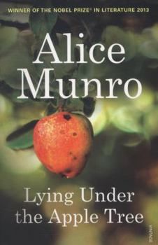 Paperback Lying Under the Apple Tree Book