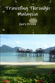 Paperback Traveling Through Malaysia Book