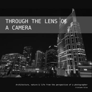 Paperback Through the lens of a camera Book
