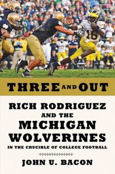 Hardcover Three and Out: Rich Rodriguez and the Michigan Wolverines in the Crucible of College Football Book