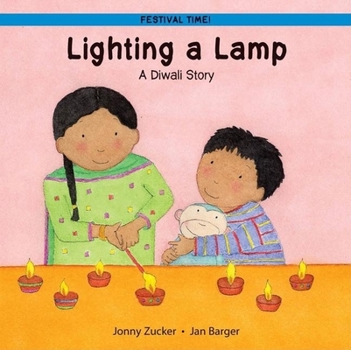 Paperback Lighting a Lamp: A Diwali Story Book