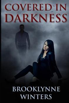 Paperback Covered In Darkness Book
